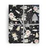 Flat box wrapped in gift wrap pattern including a boy, cat, and dog in space suits, floating through outer space with rockets, space ships, planets, and stars.