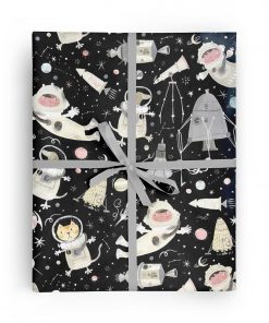 Flat box wrapped in gift wrap pattern including a boy, cat, and dog in space suits, floating through outer space with rockets, space ships, planets, and stars.